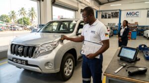 Technician appraising SUV with r…